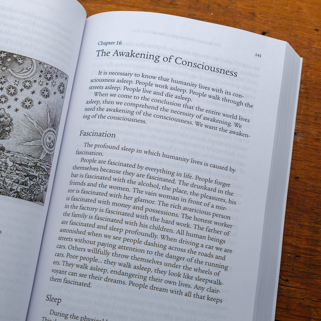 Page 141 of Perfect Matrimony is open on a wooden surface, titled The Awakening of Consciousness, exploring themes like fascination, sleep, and the forbidden fruit of knowledge. An illustration is partially visible on the left.