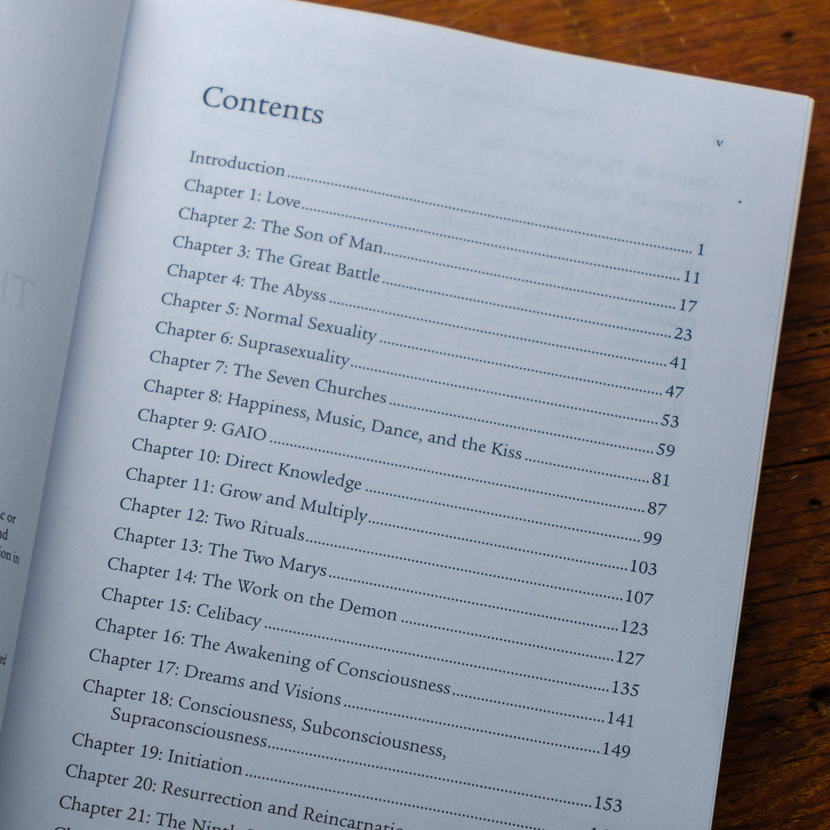 The book Perfect Matrimony includes chapters like Love, Perfect Matrimony, and The Great Battle, each with page numbers. It explores themes such as Sexual Teachings and the forbidden fruit, all printed on lightly textured white pages.