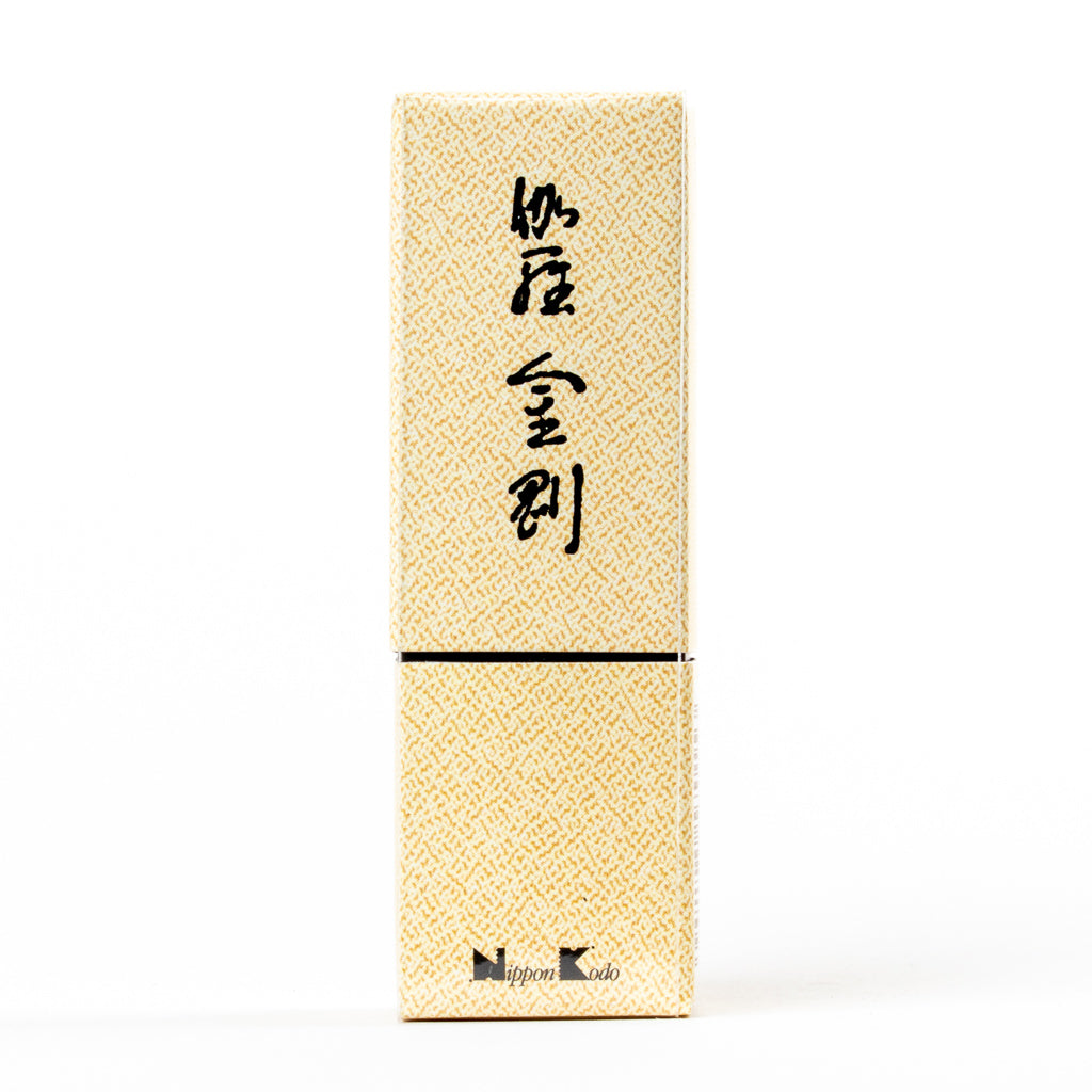 A beige rectangular box with gold patterns and black calligraphy reflects a traditional Japanese style. The brand Nippon Kodo is at the bottom, indicating it contains Kyara Kongo Aloeswood Japanese Incense.