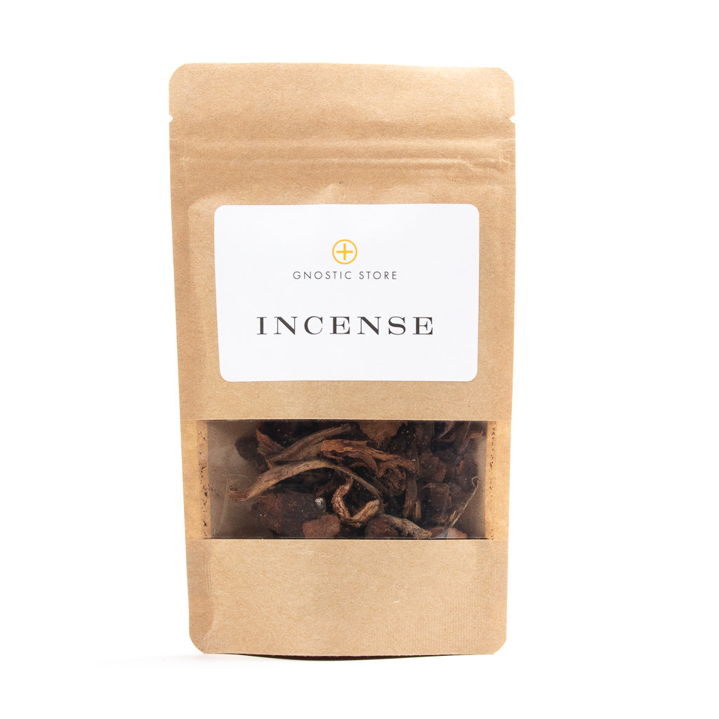 A brown paper bag labeled Storax Bark from Gnostic Store features a clear window showcasing loose incense pieces. The simple design includes a white label and yellow emblem, emphasizing the aromatic properties of Turkish Sweetgum for an enchanting experience.